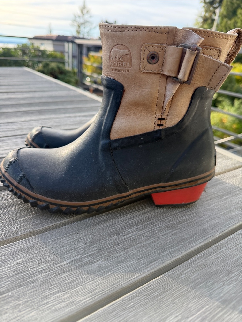 Sorel Two-Tone Black and Tan Ankle Booties with Red Heel Accent